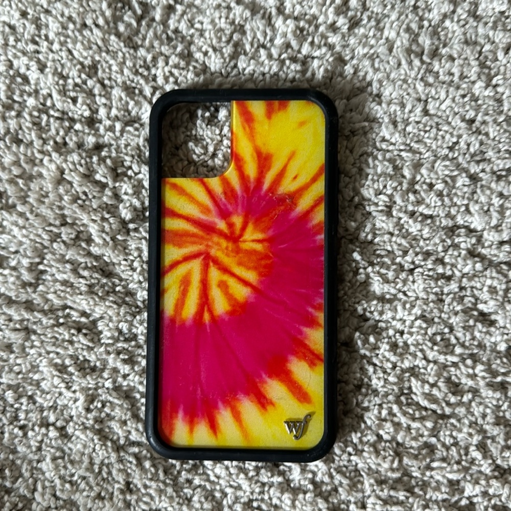 iphone 11 wildflower case! definitely has had its use but clean and not damaged